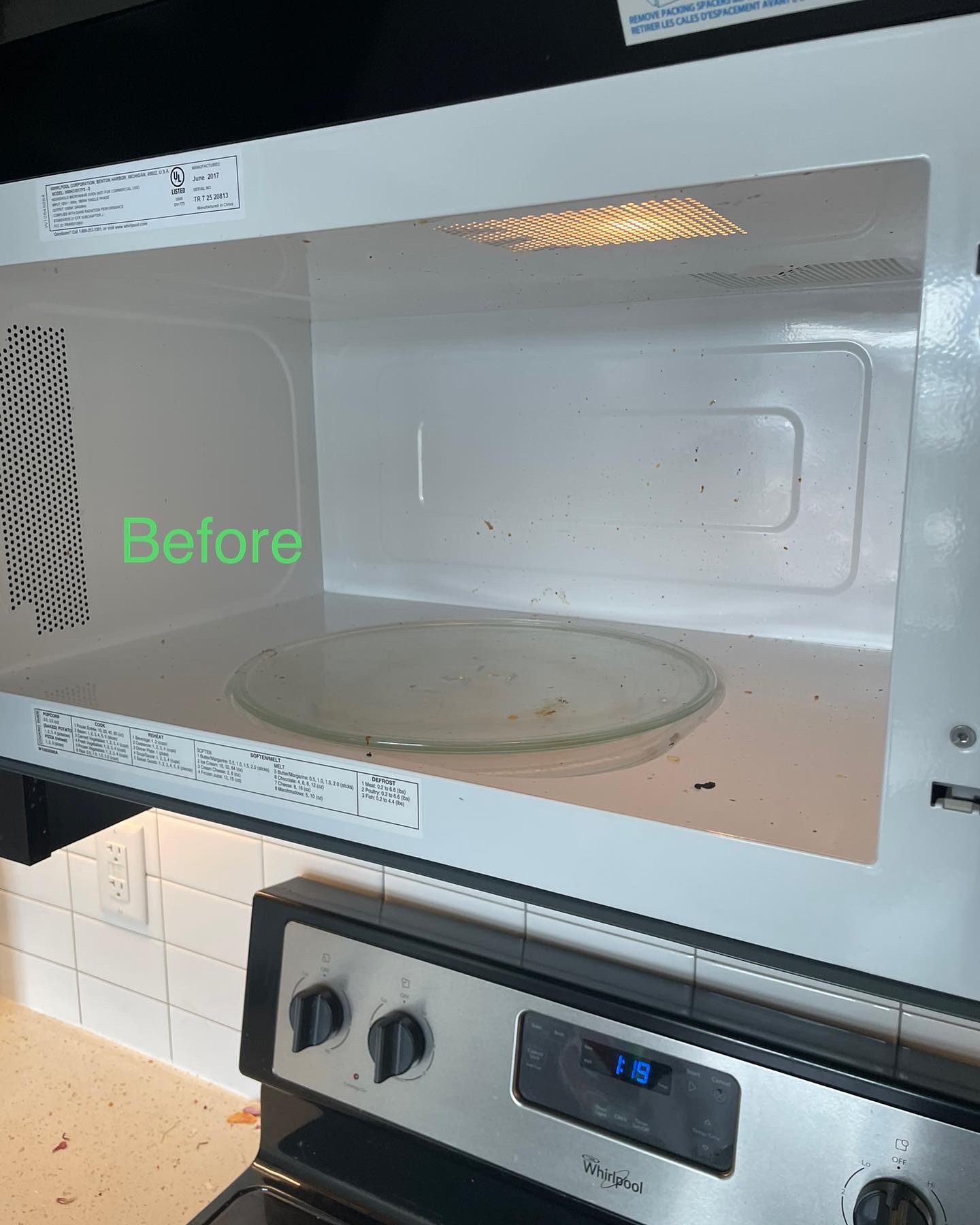 Microwave before move-out clean — food splatter and grime