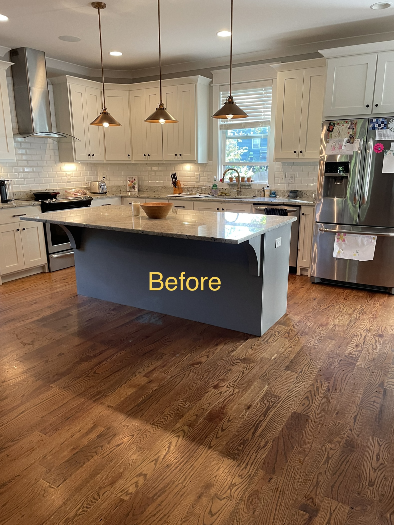 Kitchen before cleaning — dull floors, buildup on surfaces